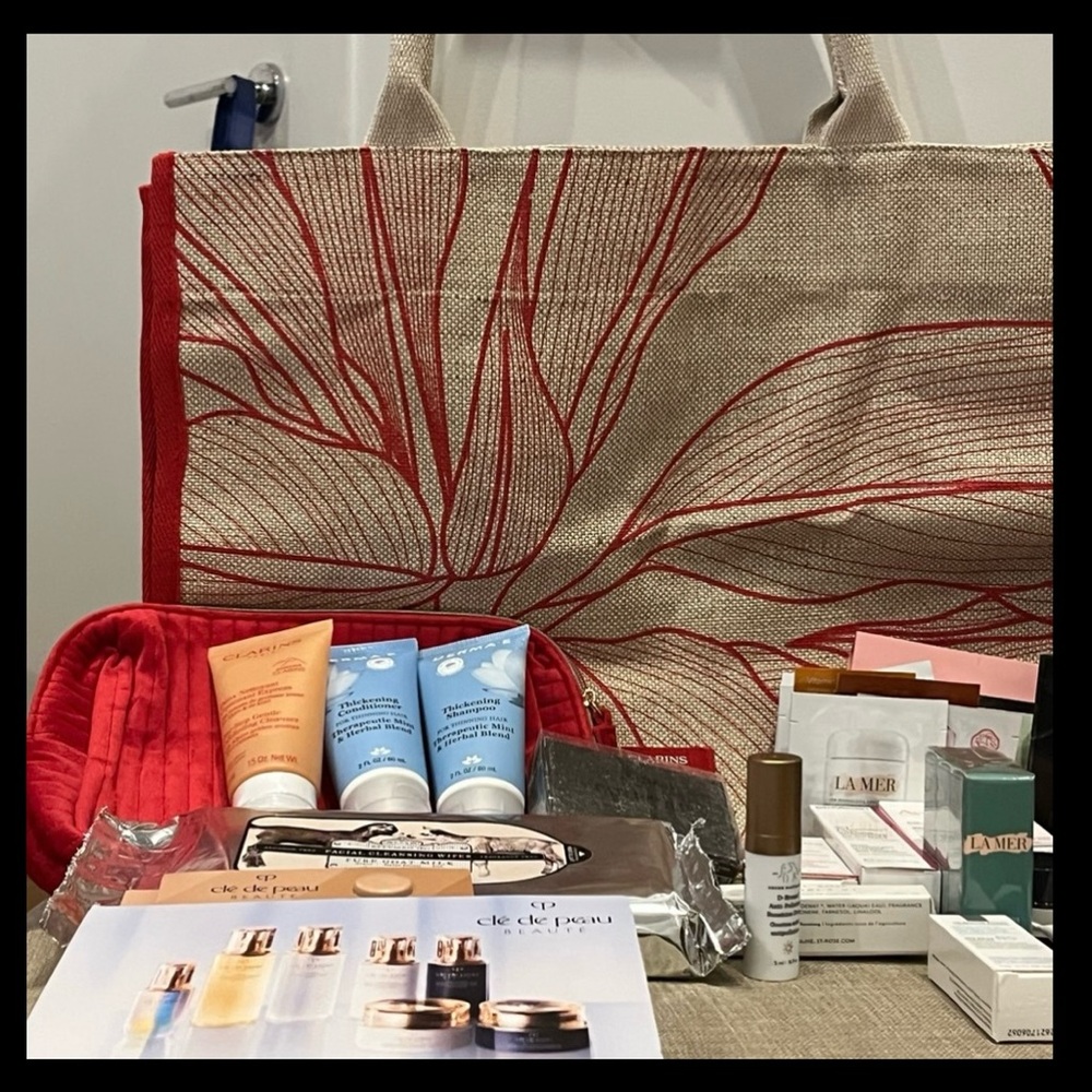 Clarins Red Eco-Friendly Women's tote with red cosmetic bag. Full of goodies😍🥳
